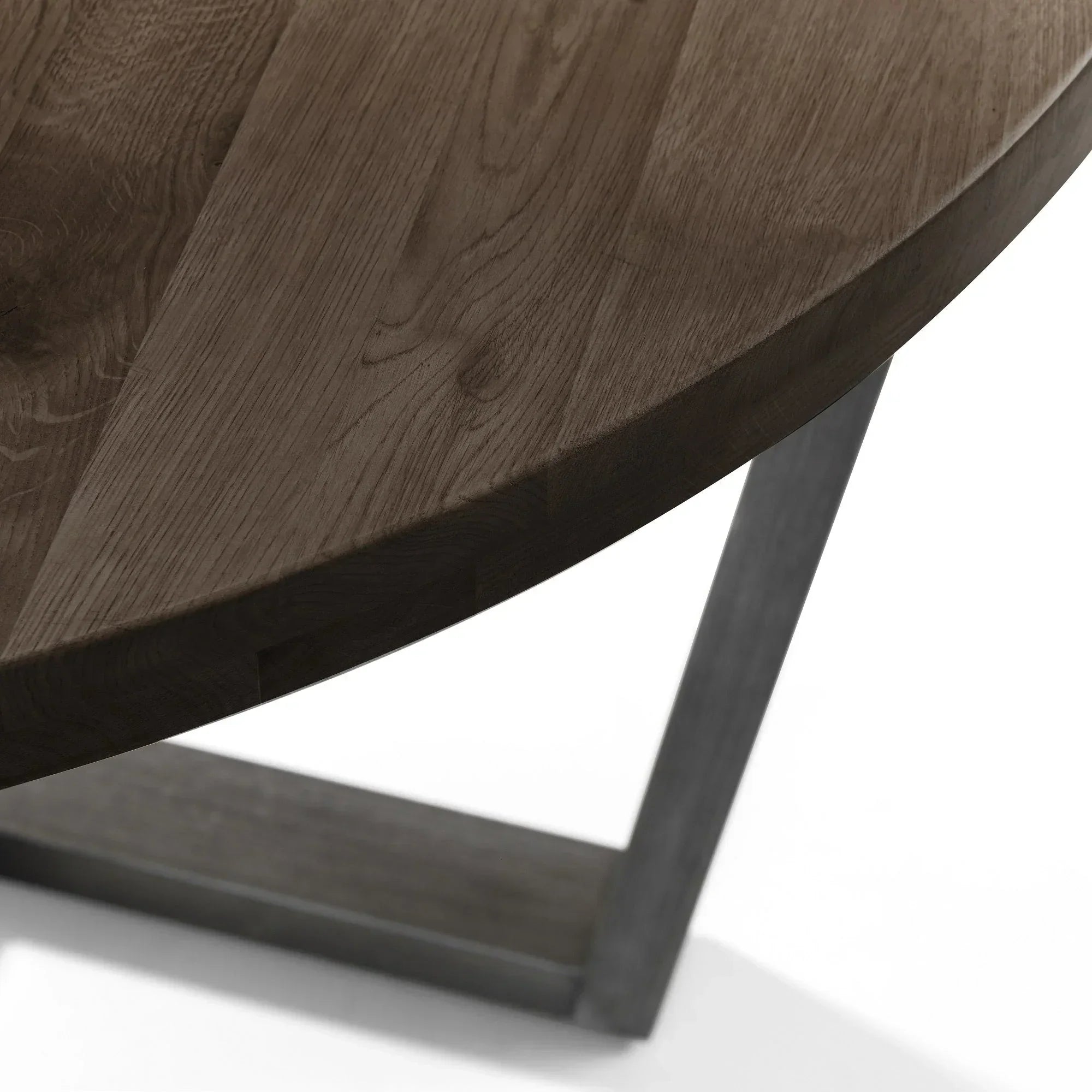 Round dining table dark oak wood top with angled leg detail