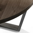 Round dining table dark oak wood top with angled leg detail