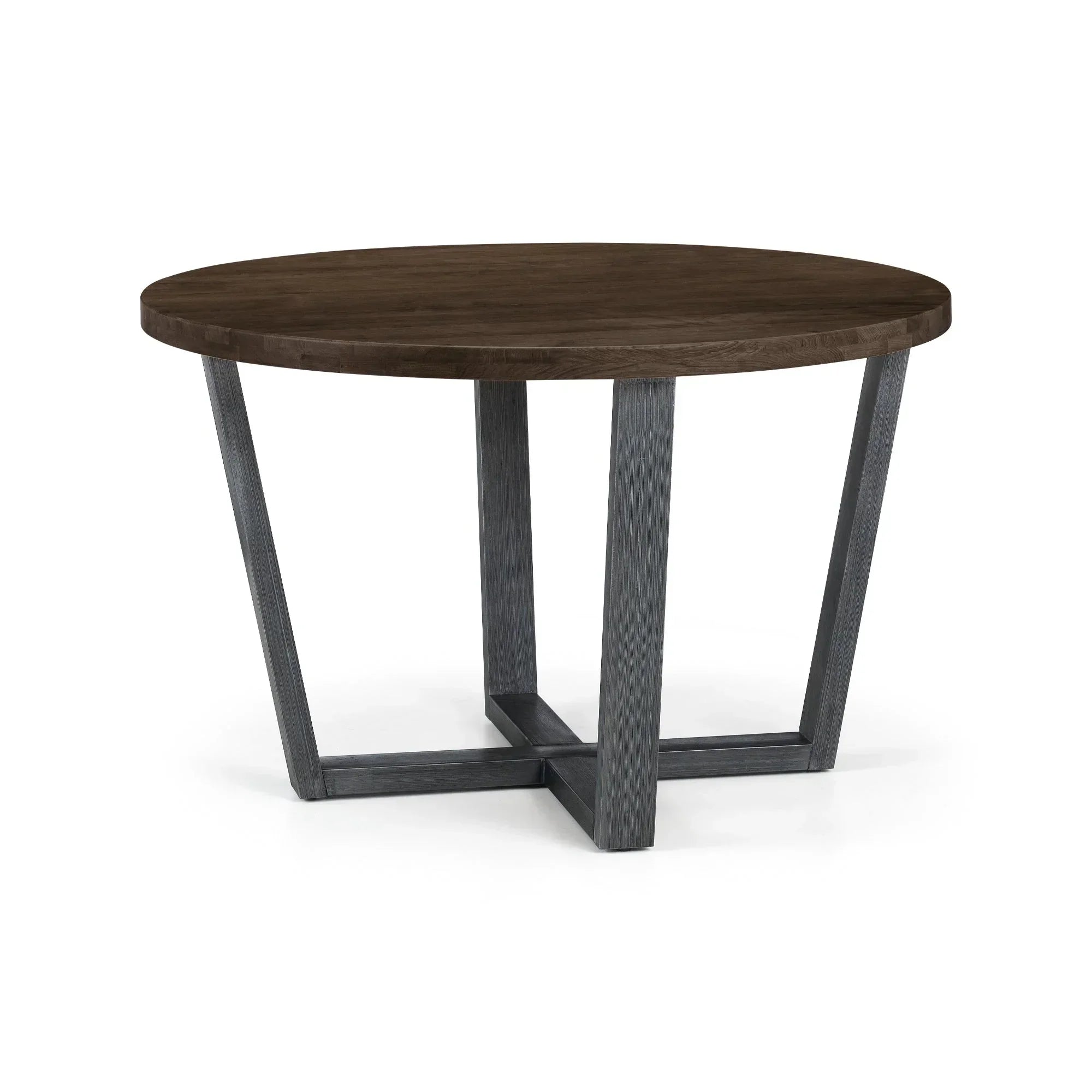 Round dining table with dark oak top and crossed metal legs on white background