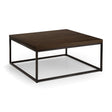 Dark oak square coffee table with black metal frame on white background