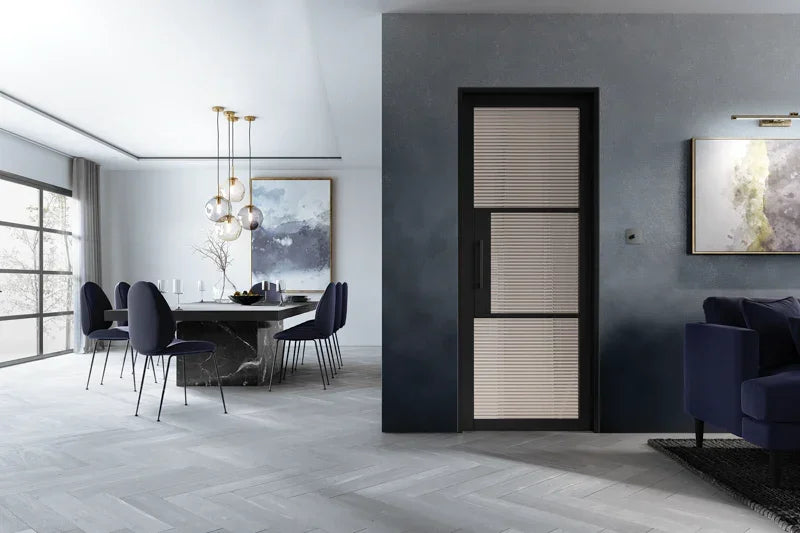 Black Tribeca glazed 3L reeded door installed in modern dining and living room setting