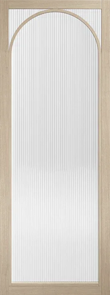 Blonde oak internal door with reeded glazed panel and arched top detail