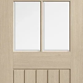 Blonde oak Mexicano door with arched square top glazed panels and vertical grooves