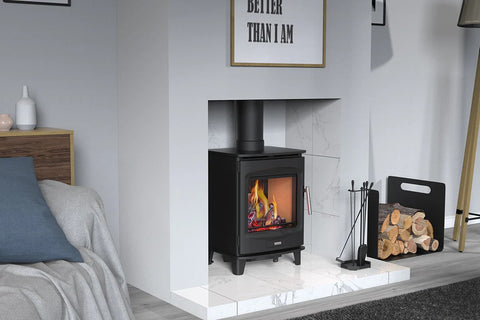 Hi-Flame Brogan stove on seamless store stand showing flame view