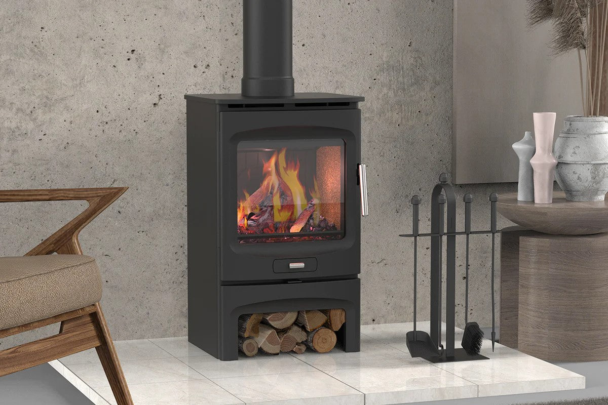 Close-up of Brogan stove large glass flame view and cast iron door