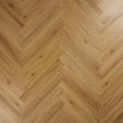 Brushed oak wood flooring in herringbone pattern, close-up of natural wood grain texture