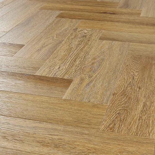 Brushed oak engineered wood flooring in herringbone pattern, close-up angle