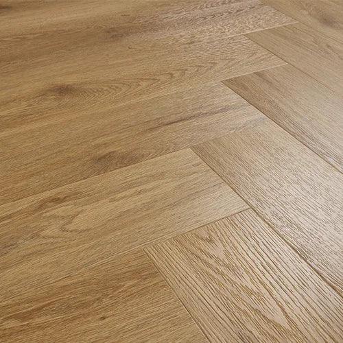 Brushed oak wood flooring in herringbone pattern with natural grain texture
