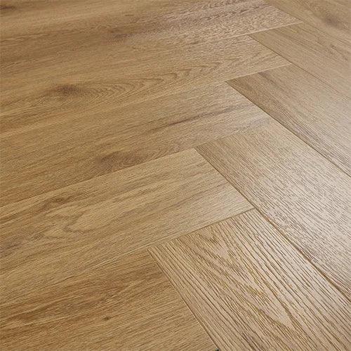 Brushed oak wood flooring in herringbone pattern with natural grain texture