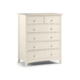 Cream chest of drawers with seven drawers and wooden knobs, angled front view