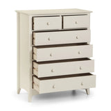 Cream chest of drawers with six drawers partially open, wooden knobs and tapered legs