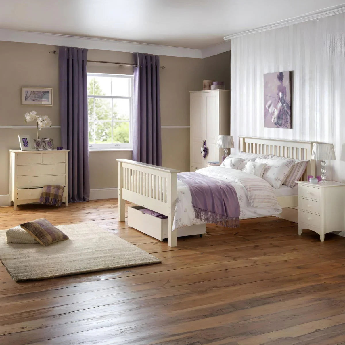 Cream wooden bed frame with lilac bedding in spacious bedroom with dresser and curtains