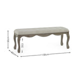Bench with beige tufted fabric top and carved natural wood frame with cabriole legs with dimension labels