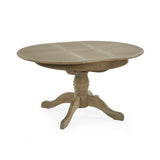 Round wooden extending table with light brown finish, side view, pedestal base with four curved feet