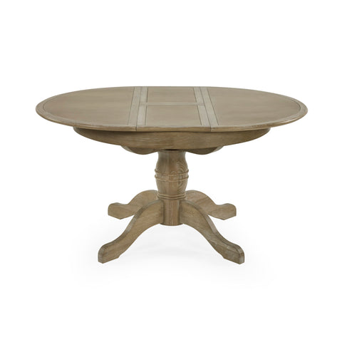 Close-up of round wooden table extension top with natural grain, light brown finish