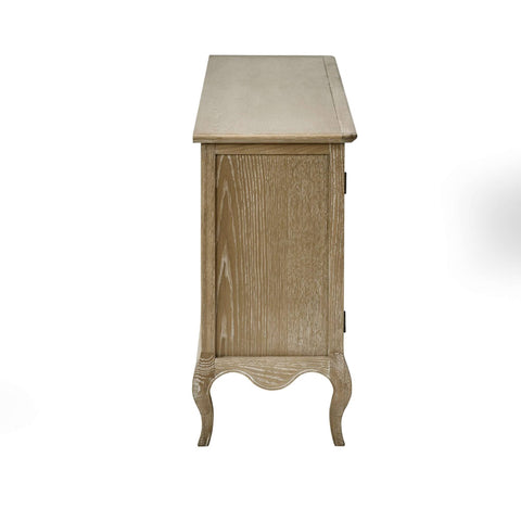The Camille French Style 2 Door 2 Drawer Sideboard in limed oak features a smooth top and elegantly curved legs, showcasing a light, natural wood finish that enhances its classic design