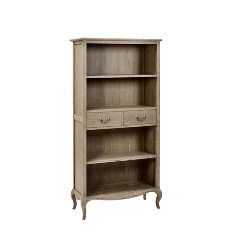 The Camille French Style Tall Bookcase features a limed oak finish with two drawers and three open shelves, elegantly designed with curved legs, perfect for displaying books and decor in a stylish living space