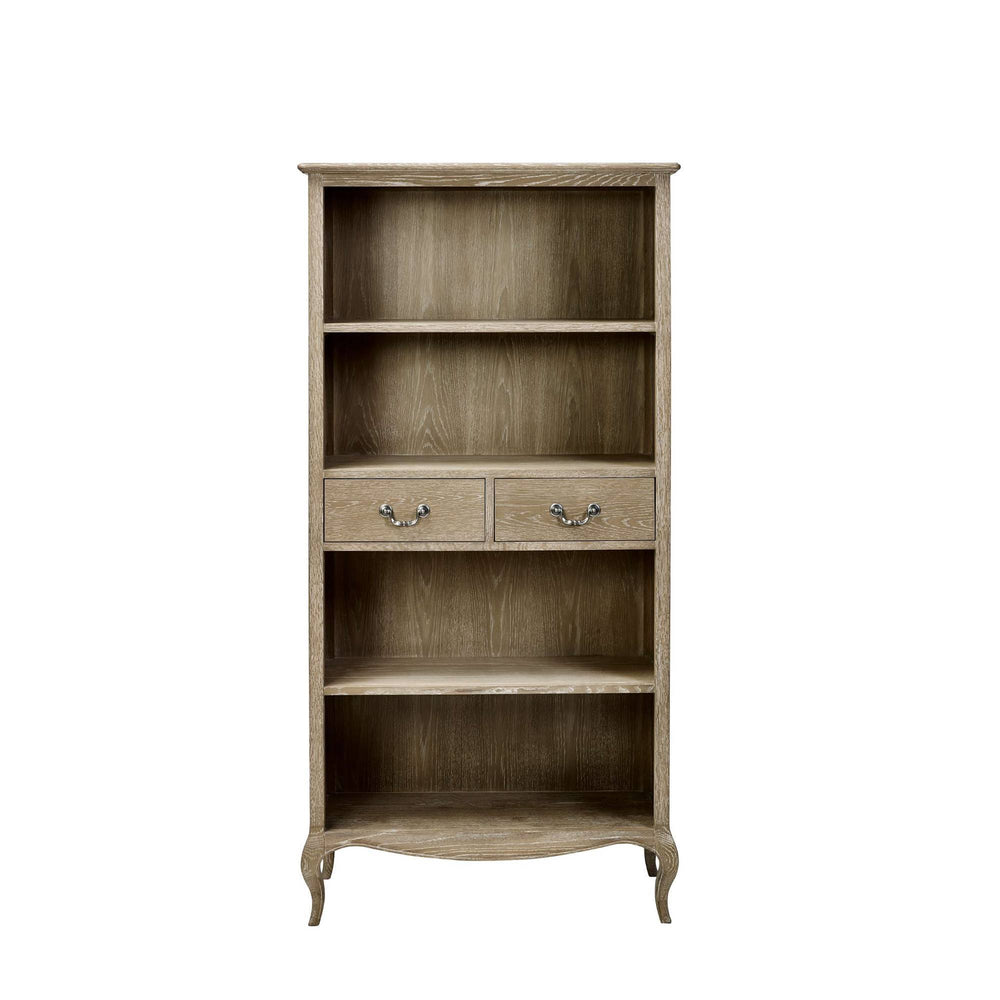 The Camille French Style Tall Bookcase features a limed oak finish with two drawers and open shelving, showcasing a classic design ideal for adding elegance to any room