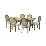 The Camille French Style Rectangular Extending Dining Table in limed oak features a classic design with elegantly curved legs and is accompanied by six matching chairs with caned backs and soft upholstered seats, perfect for a stylish dining room setting