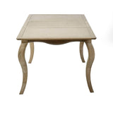 The Camille French Style Rectangular Extending Dining Table features a limed oak finish with elegantly curved legs, designed to comfortably seat 4 to 6 people