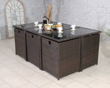 Brown rattan garden dining set with glass tabletop and coffee service in a tiled patio area
