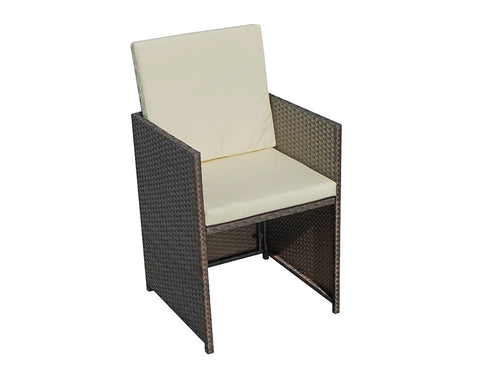 Brown rattan dining chair with cream cushions and high back