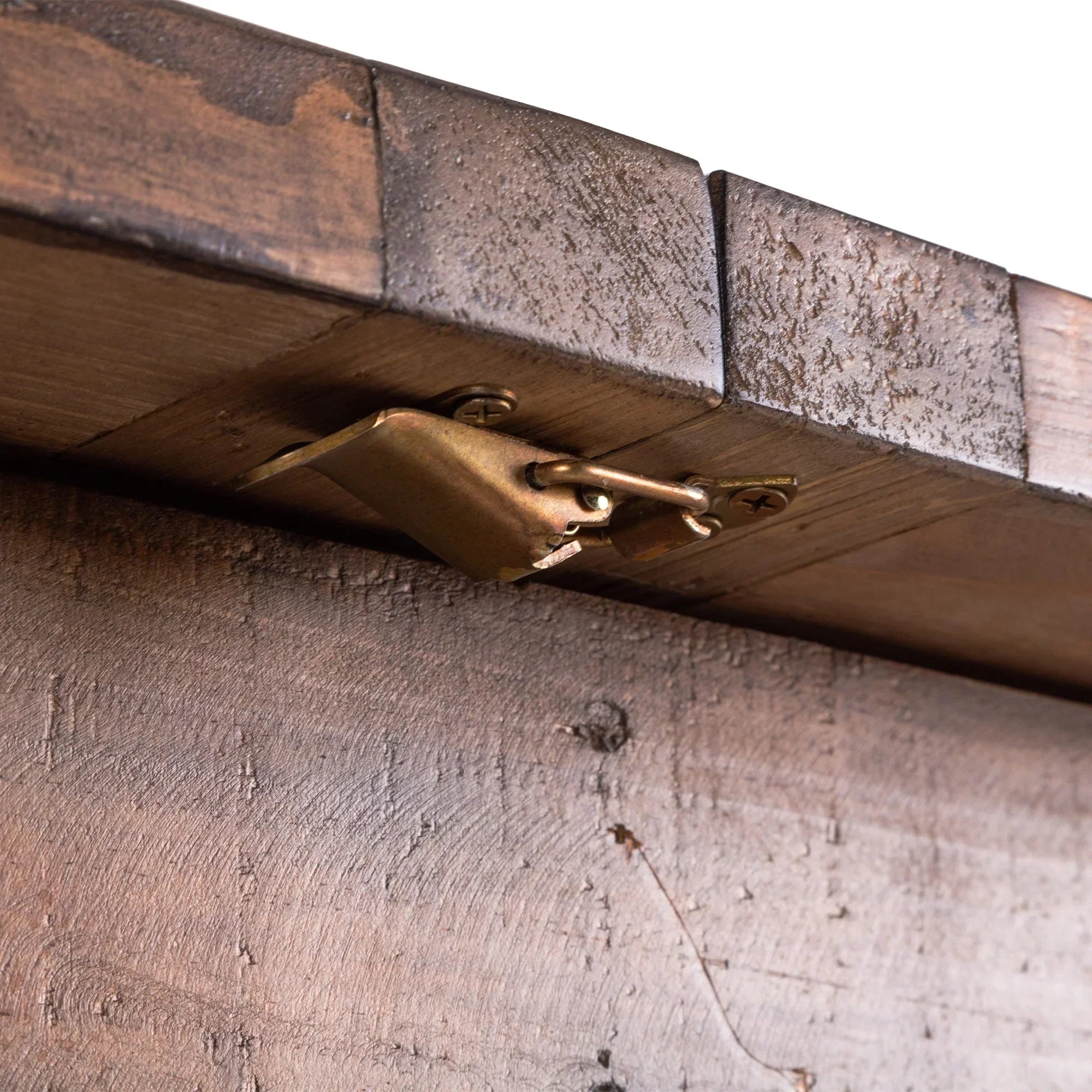 Close detail of Chatsworth extending dining table wooden surface and metal locking mechanism