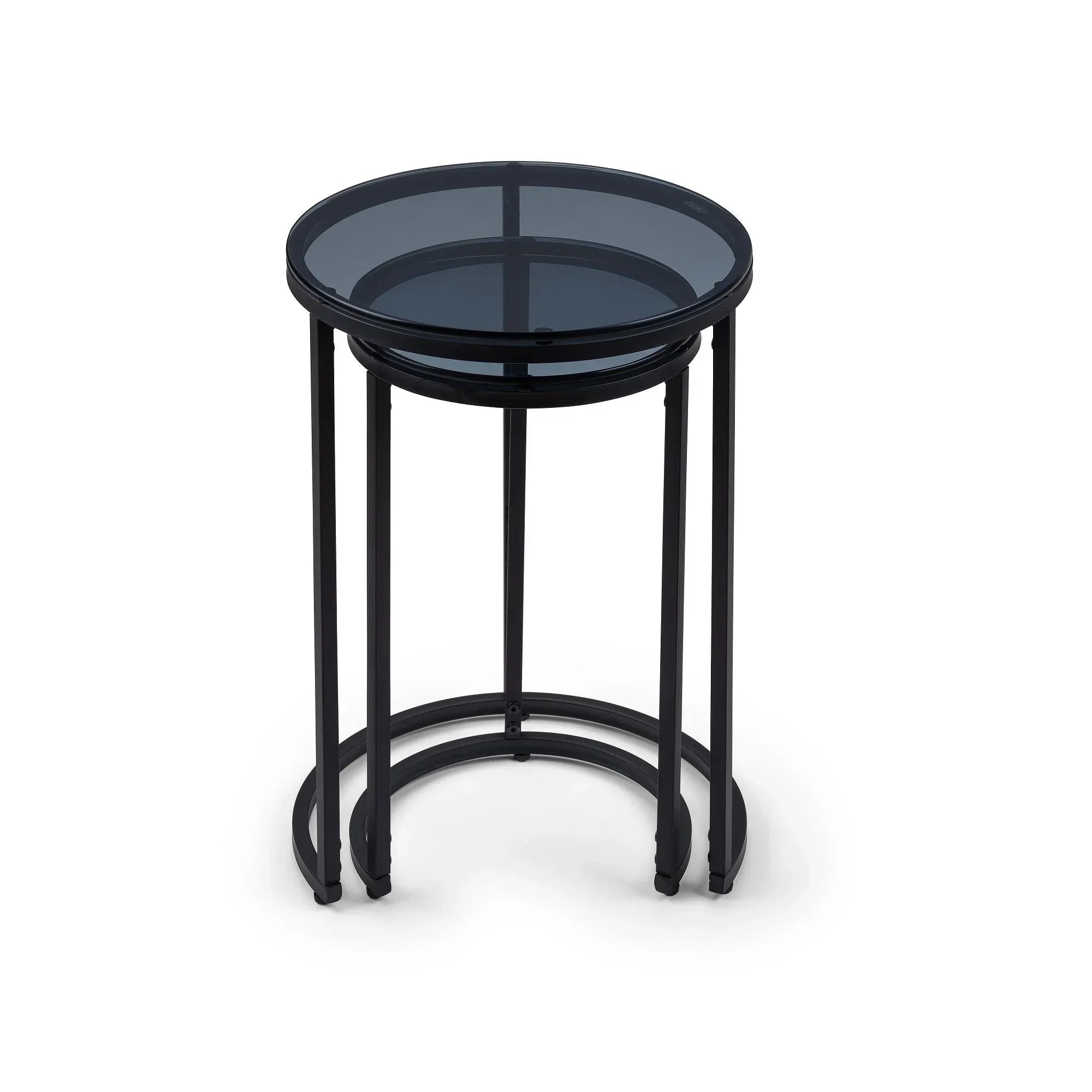 Round black metal nesting side tables with glass tops on white background