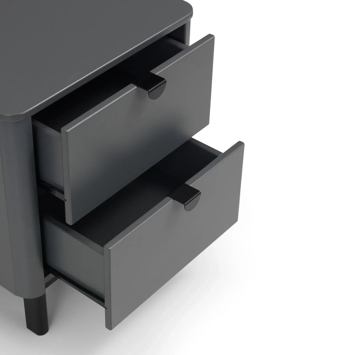Grey bedside table with two open drawers and black handles, corner angled view