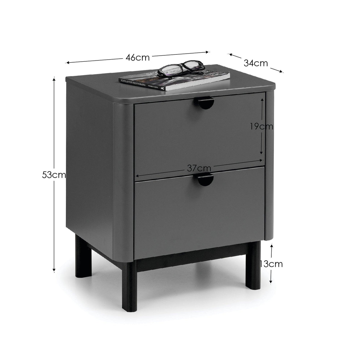 Black bedside table with two drawers and measurements, book and glasses on top