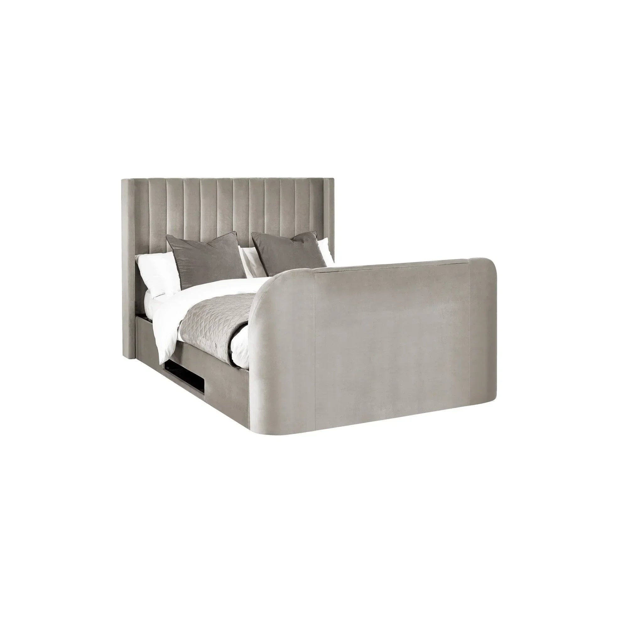 Grey upholstered storage bed with high headboard and footboard, styled with pillows and bedding