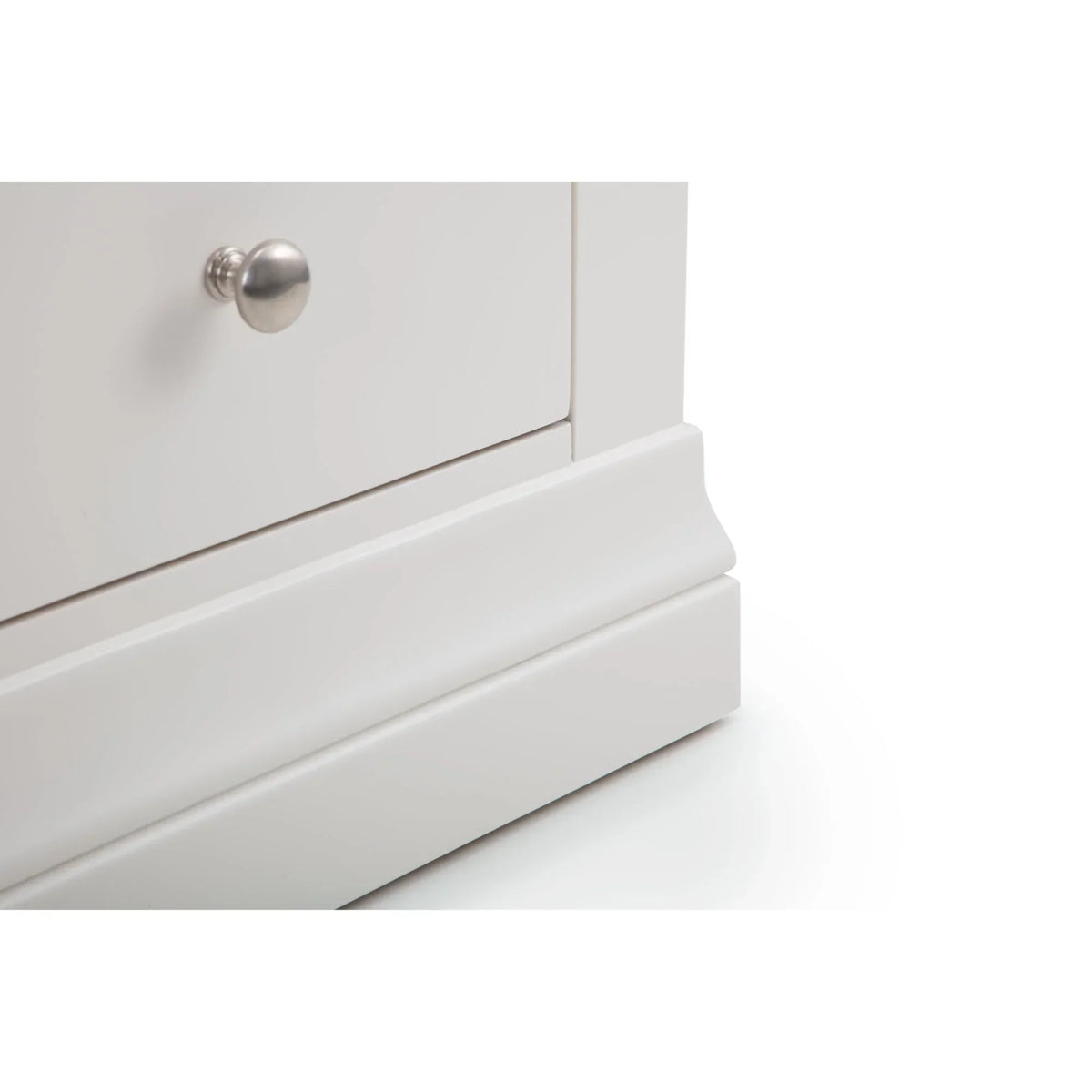 Close-up of surf white bedside table drawer base with metal knob detail