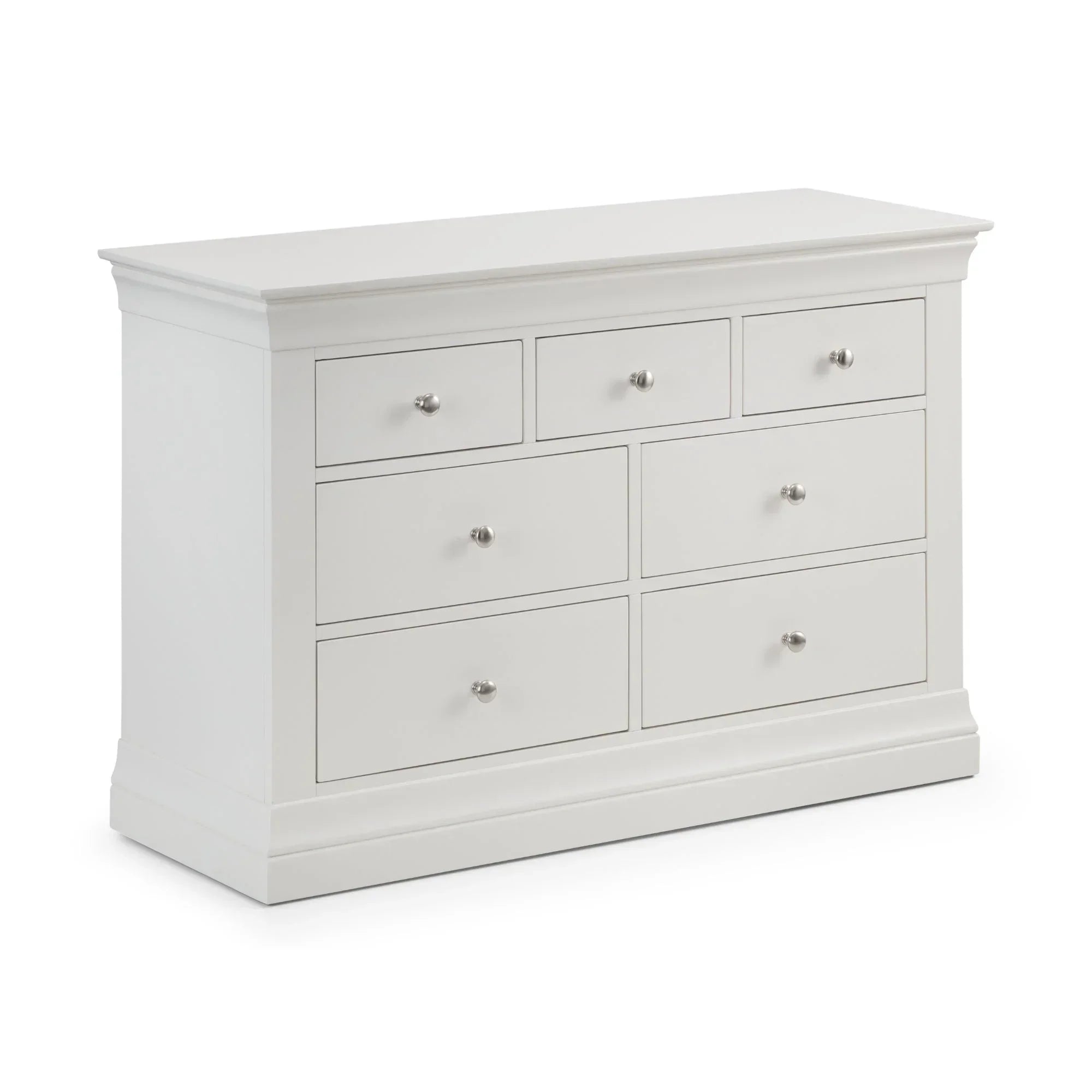 White chest of drawers with seven drawers and silver handles, shown from angled front view