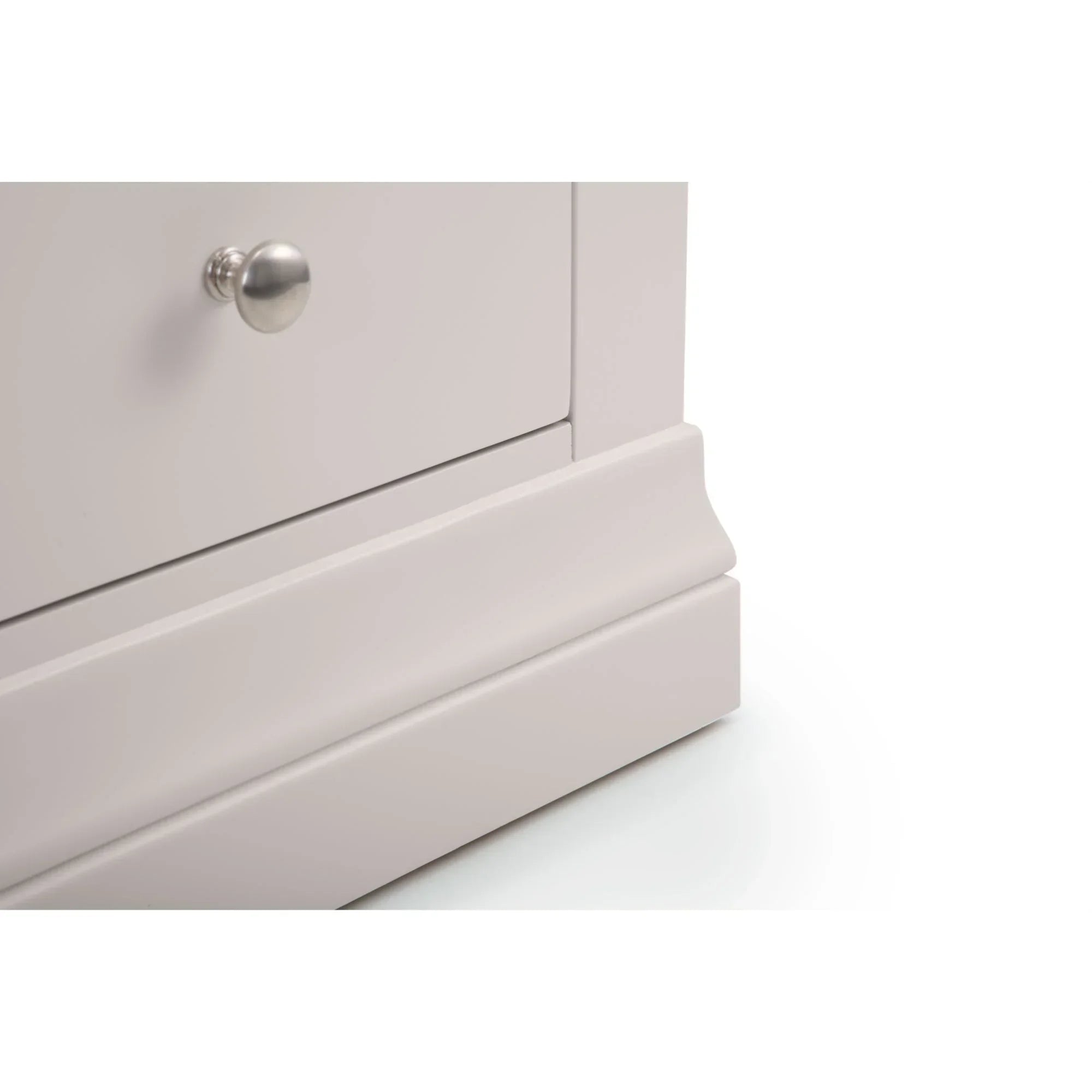 Light grey drawer chest base with metal knob and detailed plinth