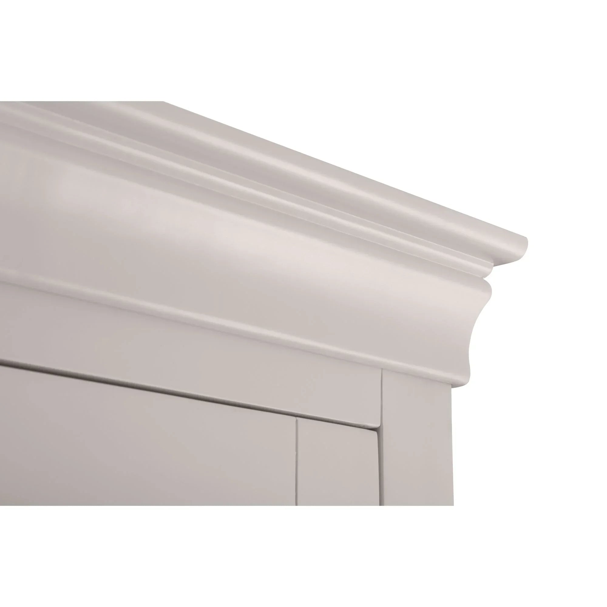 Light grey wardrobe top corner with moulded trim detailing