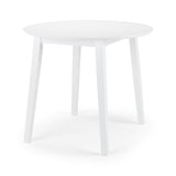 White round dropleaf table with four legs against white background