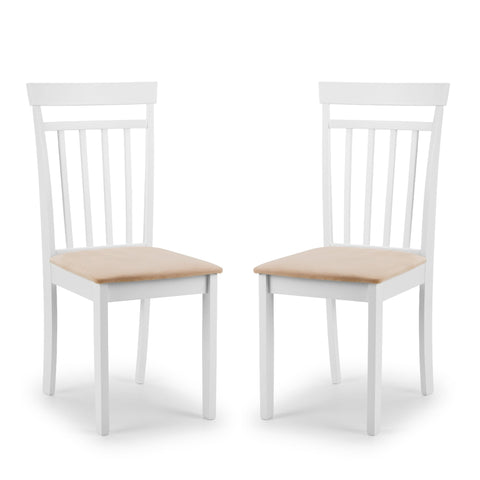 Pair of white wooden dining chairs with beige cushioned seats on white background.