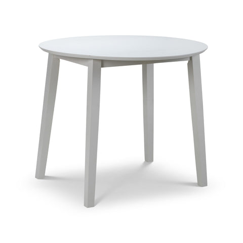 Round white wooden table with all dropleaf sections unfolded