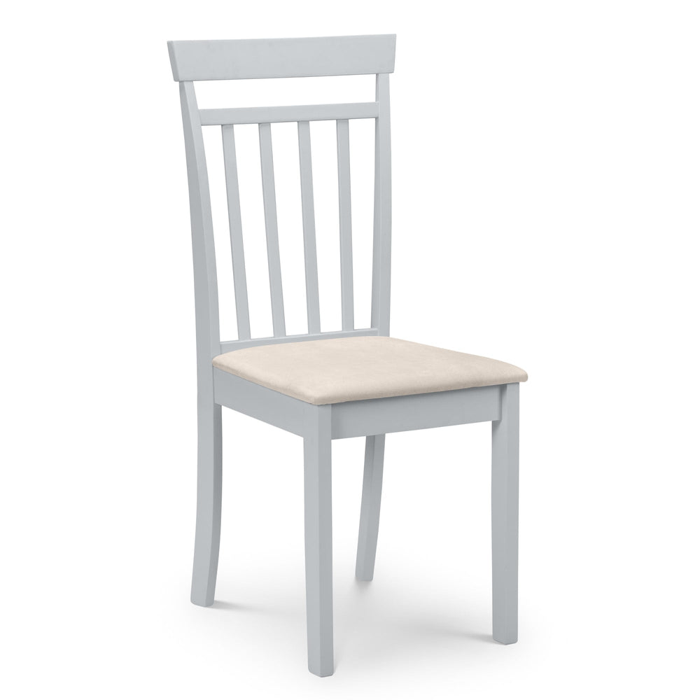 Light grey wooden dining chair with vertical slatted back and cream cushioned seat, isolated