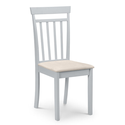 Light grey wooden dining chair with vertical slatted back and cream cushioned seat, isolated