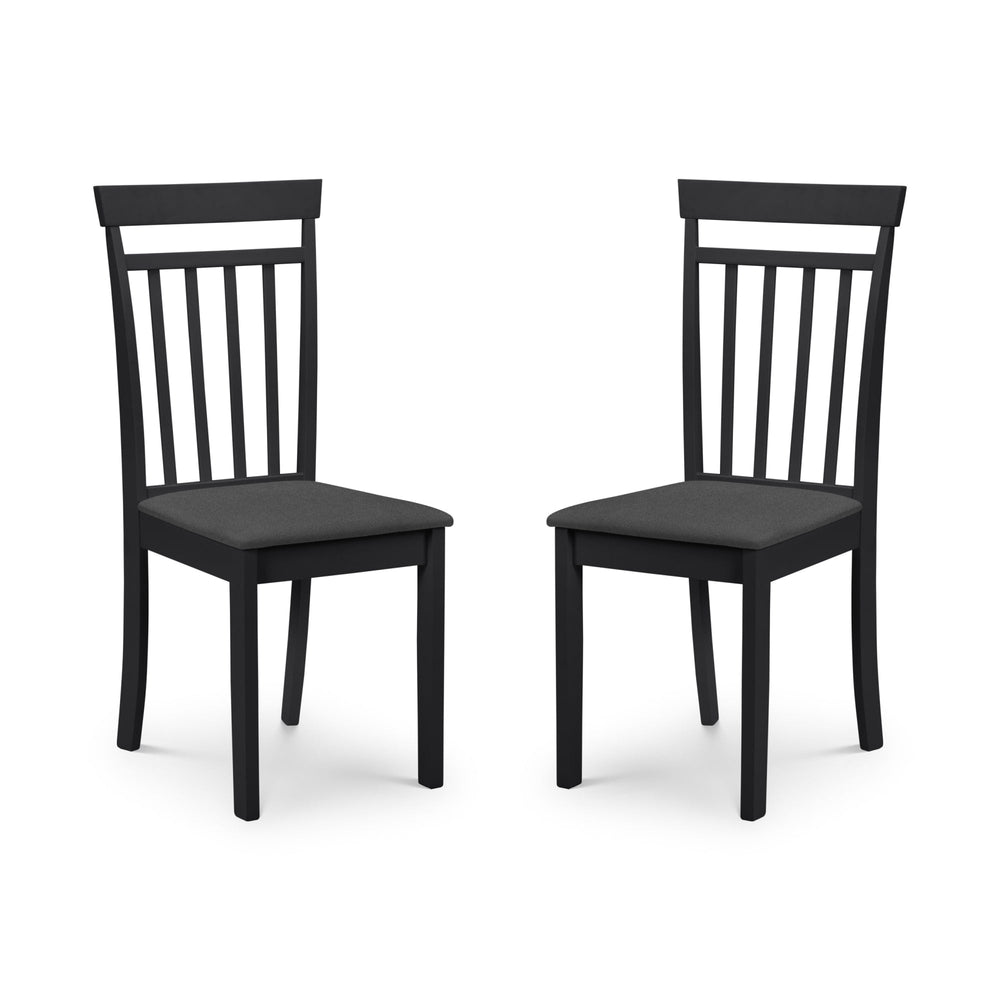 Two black wooden dining chairs with vertical slats and dark grey cushioned seats, side view