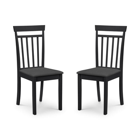 Two black wooden dining chairs with vertical slats and dark grey cushioned seats, side view