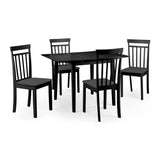 Four black wooden dining chairs with dark grey cushions around a black dining table, angled view
