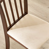 Close-up of backrest vertical slats and beige cushioned seat of brown wooden dining chair