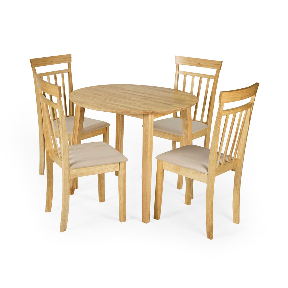 Set of four light wood dining chairs with beige padded seats arranged around a round wooden table