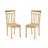 Pair of identical wooden dining chairs with vertical slat backs and beige cushioned seats, facing forward
