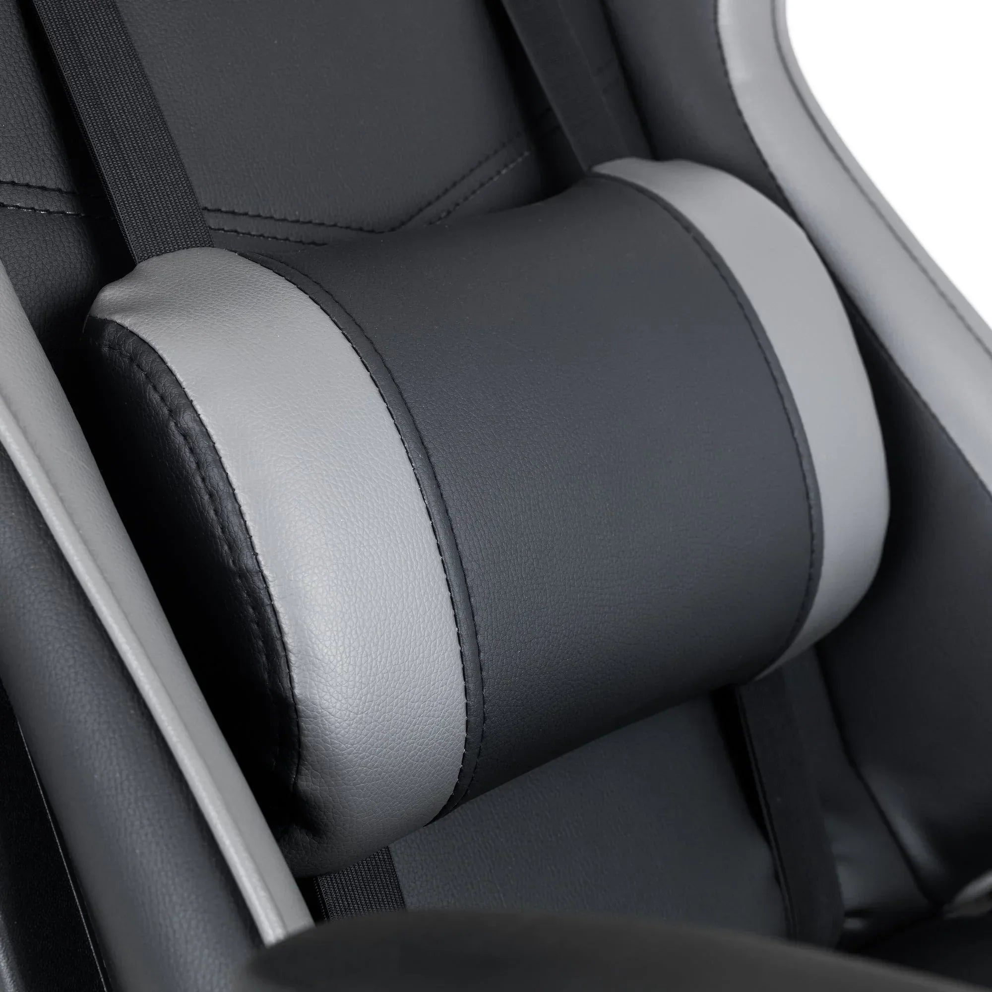 Closeup of black and grey Comet gaming chair with lumbar support cushion