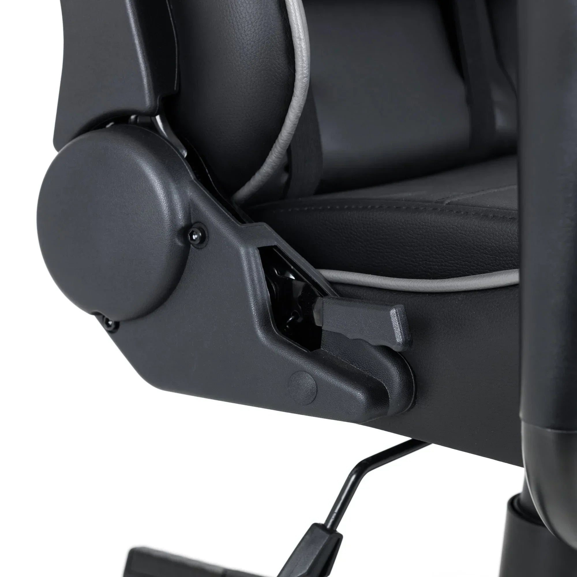 Comet gaming chair adjustable recline mechanism and armrest closeup, black leather finish