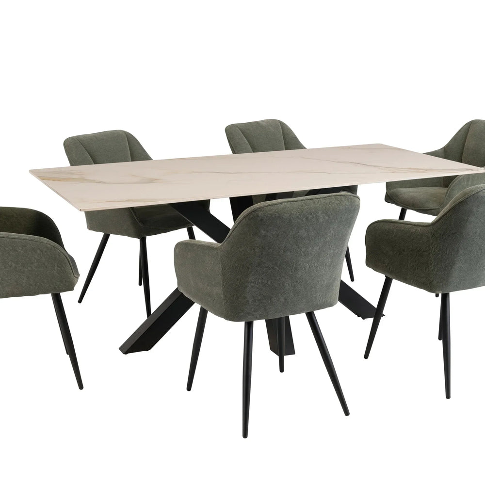 Modern dining table set with marble effect top and six green upholstered chairs