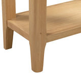 Oak console table leg and lower shelf detail in natural wood finish